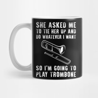 Brass and Laughter: Unleash Your Playful Trombone Skills! Mug